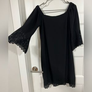 Black, slightly form fitting dress